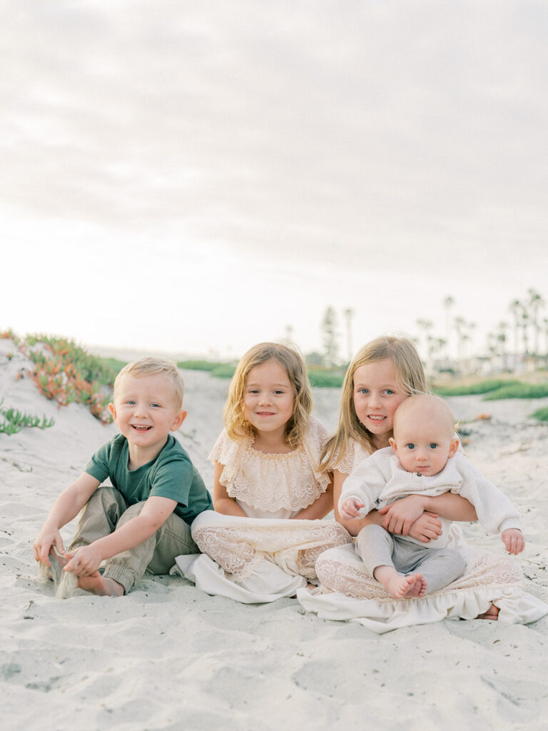 Siblings' family photo at Coronado beach