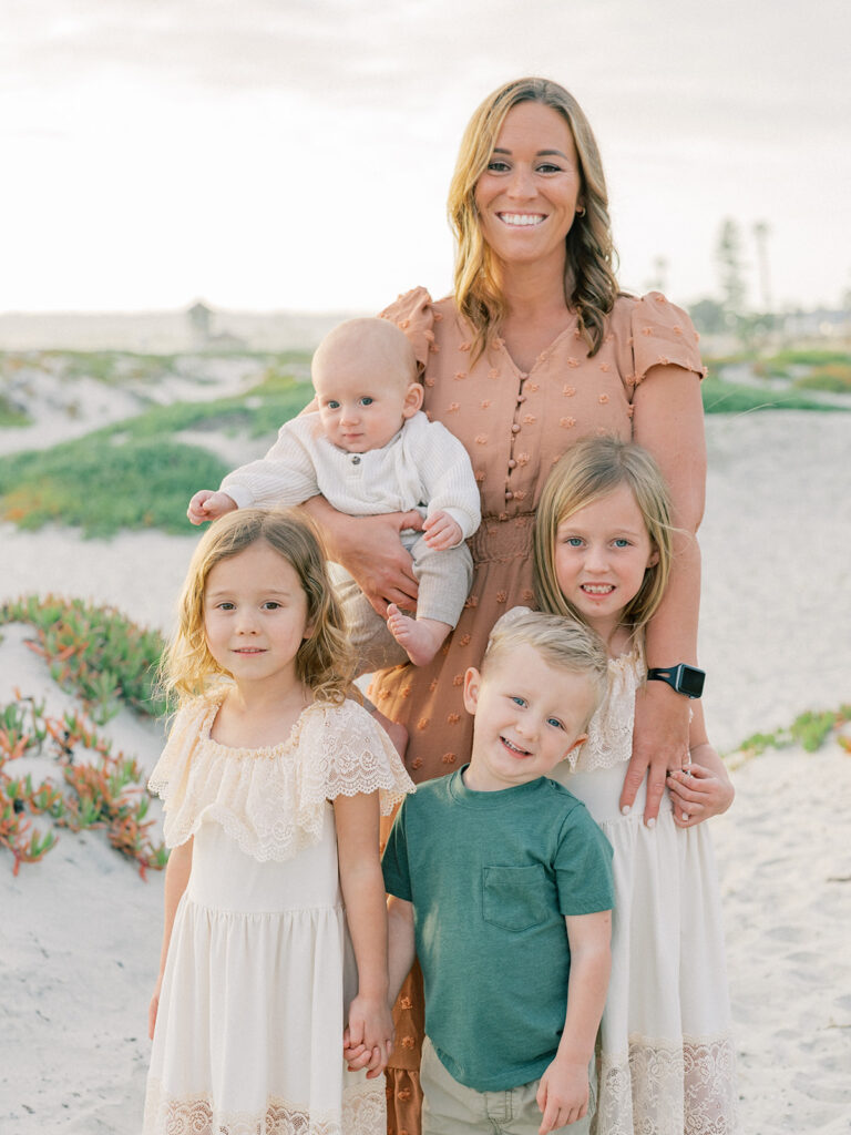 Mother with her kids family photo at Coronado beach