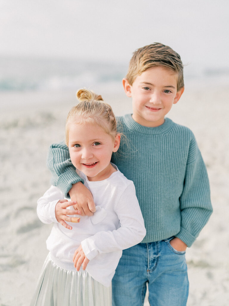 Little boy with her little sister during La Jolla family photography session