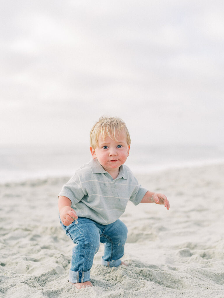 Toddler striking a pose at La Jolla shores