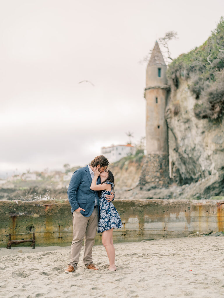 Engagement Session with the Iconic Pirate Tower of Laguna Beach as a backdrop