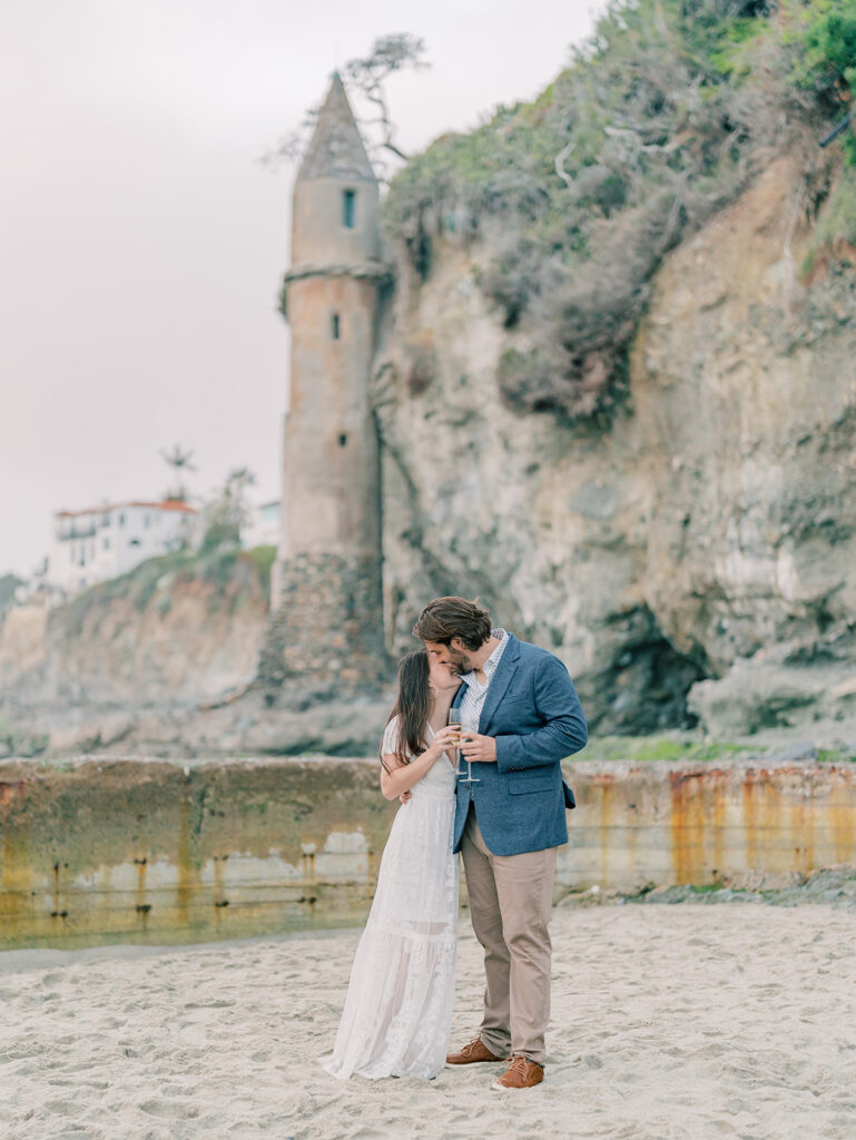 Engagement Session with the Iconic Pirate Tower of Laguna Beach as a backdrop