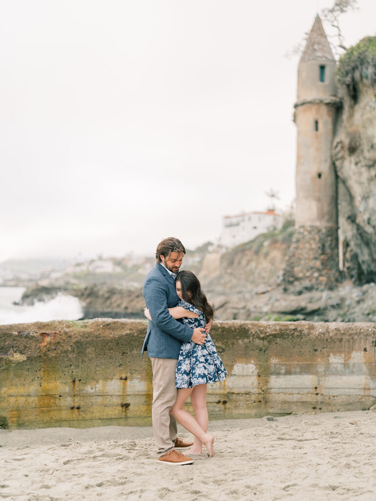 Engagement Session with the Iconic Pirate Tower of Laguna Beach as a backdrop