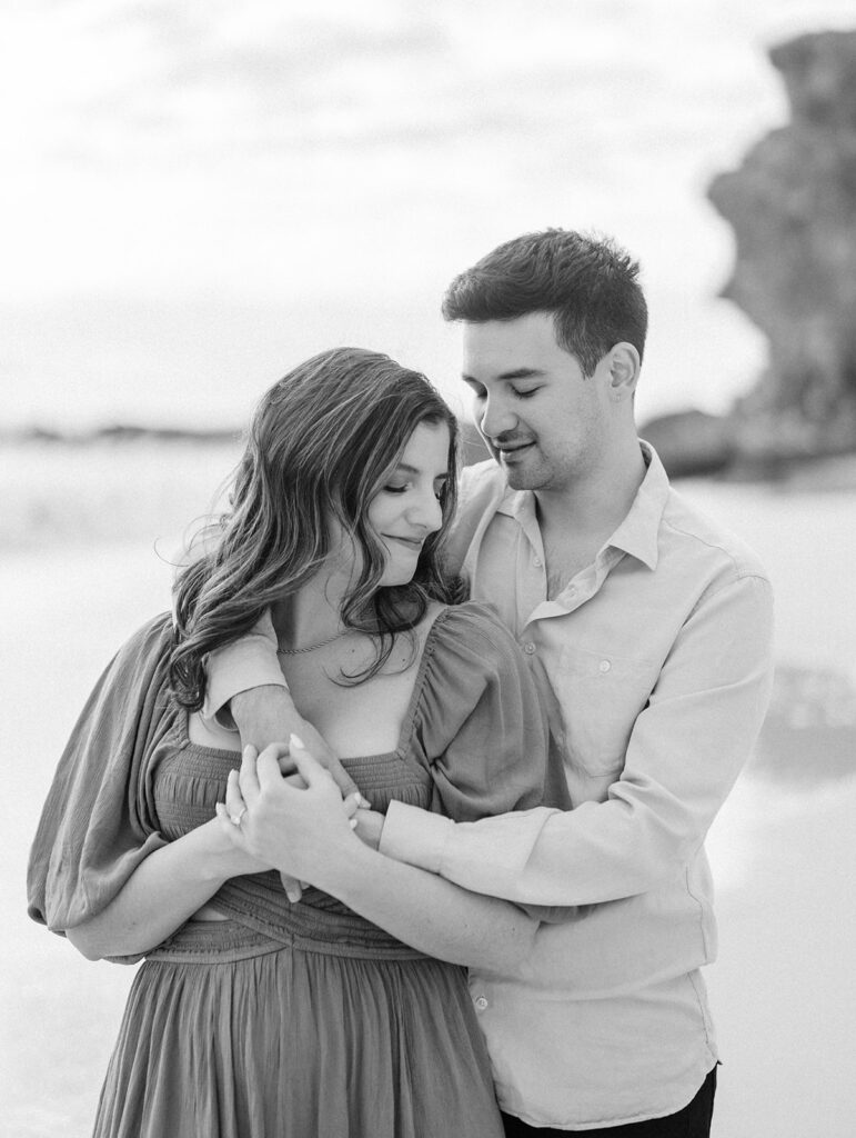 Black and white portrait of a couple during engagement shoot at Thousand steps beach in Laguna Beach