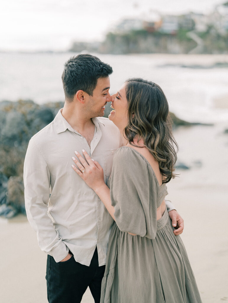 A couple sharing a joyful moment, laughing together 