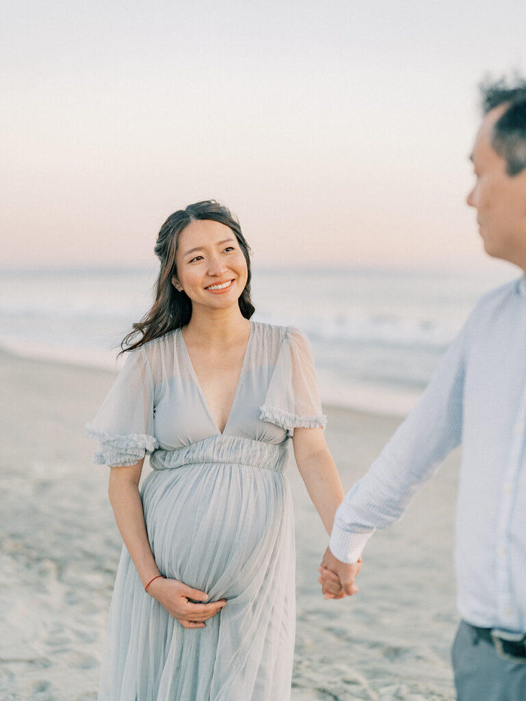 Pregnant wife looking at her husband