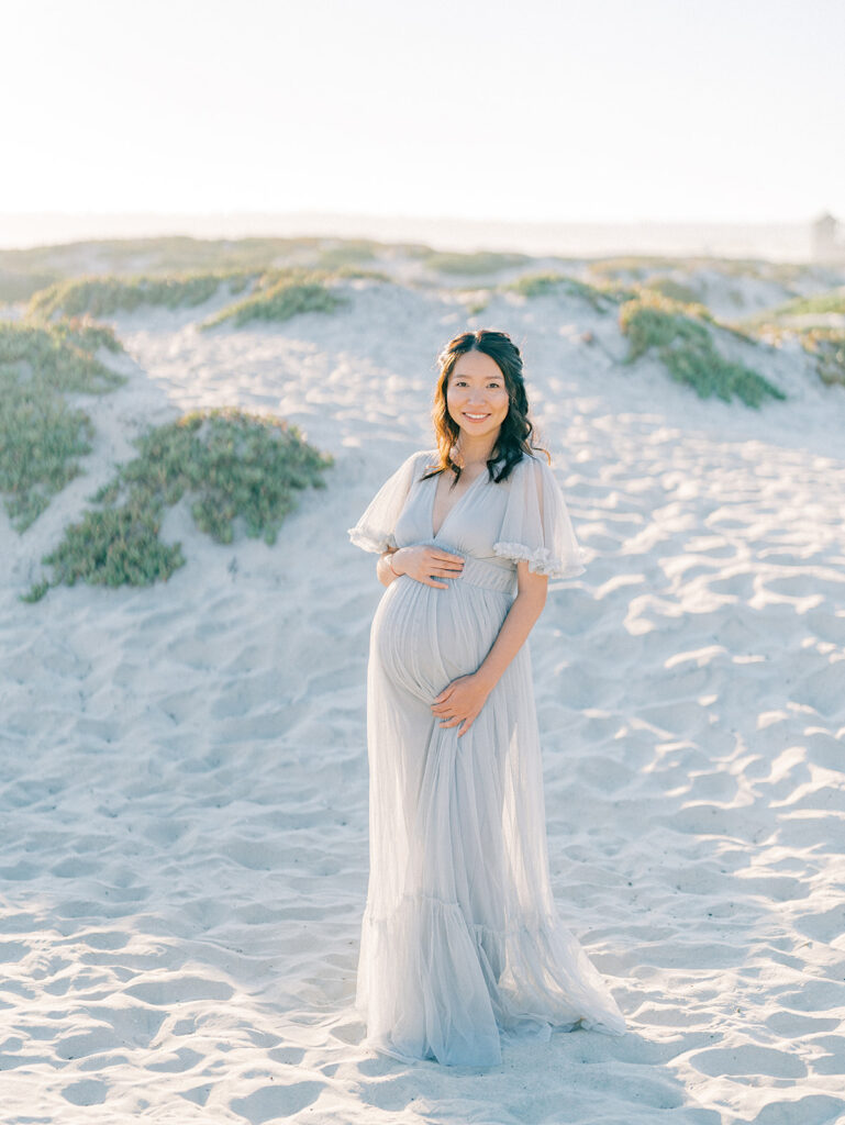 Maternity shoot in front of Coronado Beach