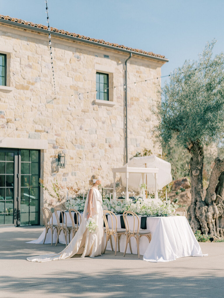 a bride looking at the tree