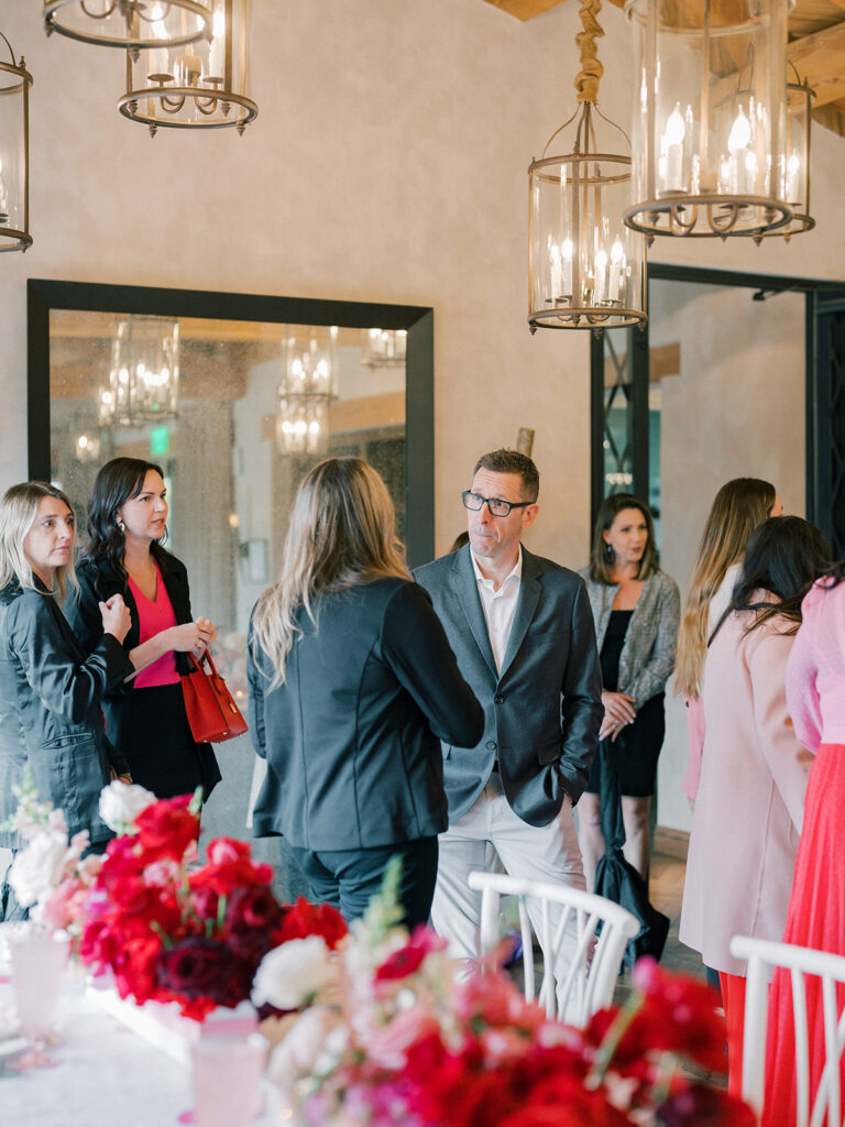 a group of vendors talking