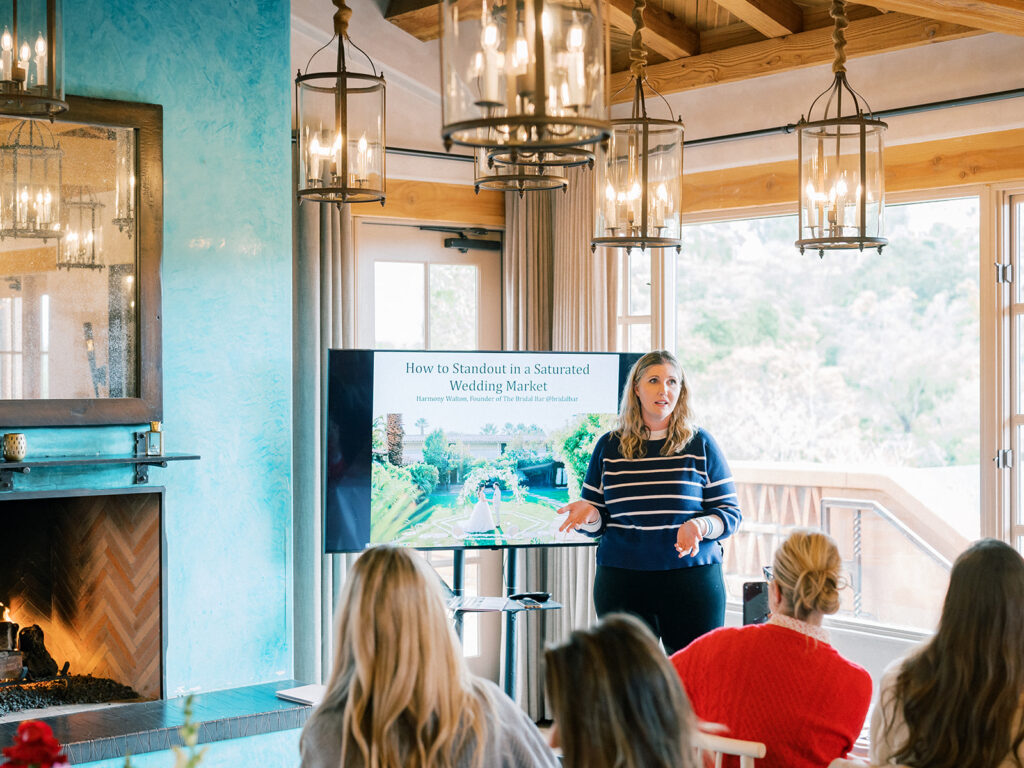 a speaker discussing during rancho valencia brunch