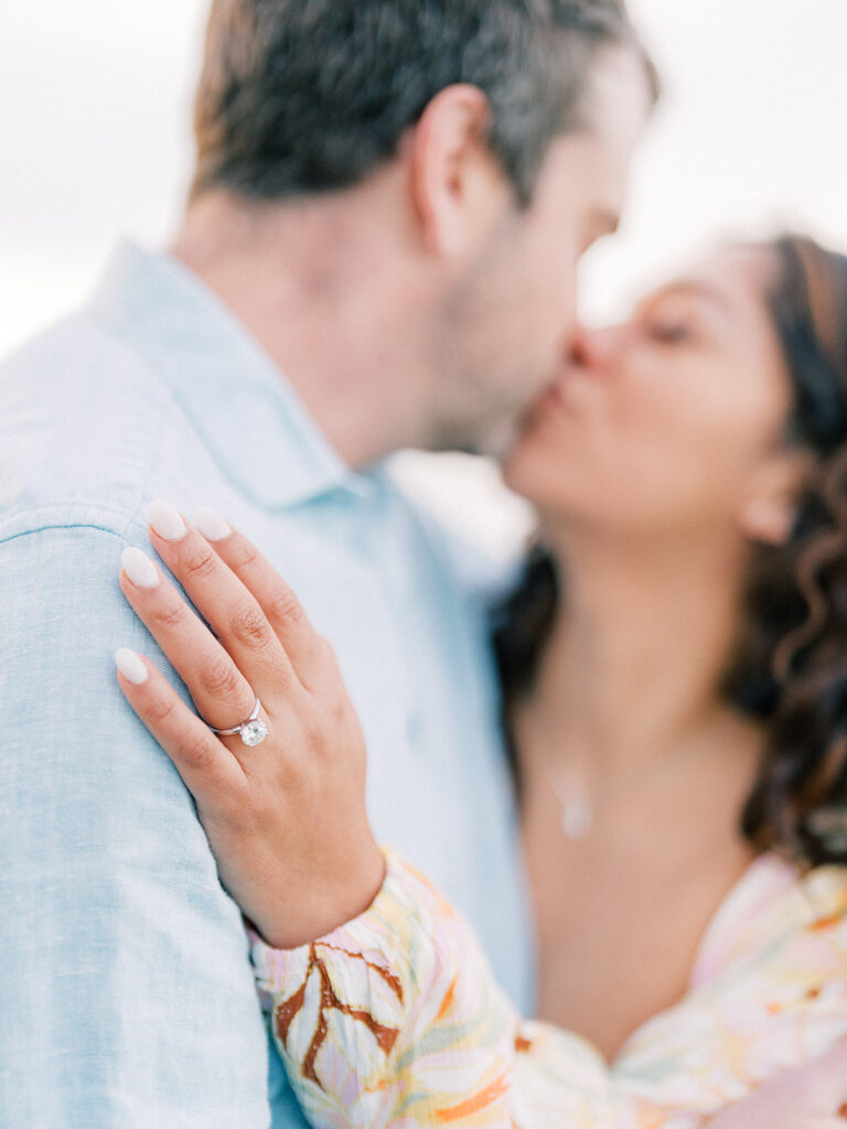 a couple kissing at laguna beach captured by san diego beach photographer